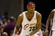 CLEVELAND - DECEMBER 9:  LeBron James #23 of the Cleveland Cavaliers passes the ball during the game against the Toronto Raptors at Gund Arena on December 9, 2003 in Cleveland, Ohio.  The Raptorss won 100-93.  NOTE TO USER: User expressly acknowledges and agrees that, by downloading and/or using this Photograph, User is consenting to the terms and conditions of the Getty Images License Agreement (Photo by Andy Lyons/Getty Images) 