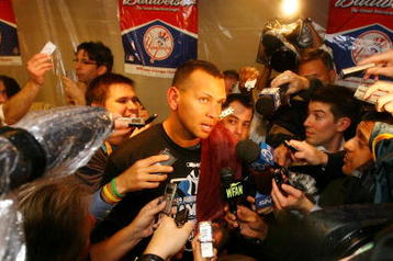 NEW YORK - OCTOBER 25:  Alex Rodriguez #13 of the New York Yankees is interviewed by the media after defeating the Los Angeles Angels of Anaheim 5-2 in Game Six of the ALCS during the 2009 MLB Playoffs at Yankee Stadium on October 25, 2009 in the Bronx borough of New York City. The New York Yankees won the ALCS series 4-2 over the Los Angeles Angels of Anaheim to capture the American League pennant.  (Photo by Al Bello/Getty Images)