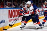 UNIONDALE, NY - OCTOBER 24:  Quintin Laing #53 of the Washington Capitals skates against the New York Islanders on October 24, 2009 at Nassau Coliseum in Uniondale, New York. The Capitals won the game 3-2 in overtime.  (Photo by Jim McIsaac/Getty Images)