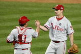 NEW YORK - OCTOBER 28:  (L-R) Carlos Ruiz #51 and Cliff Lee #34 of the Philadelphia Phillies celebrate after their 6-1 win against the New York Yankees in Game One of the 2009 MLB World Series at Yankee Stadium on October 28, 2009 in the Bronx borough of New York City.  (Photo by Al Bello/Getty Images)