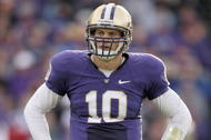 SEATTLE - OCTOBER 24: Quarterback Jake Locker #10 of the Washington Huskies looks to the sideline during the game against the Oregon Ducks on October 24, 2009 at Husky Stadium in Seattle, Washington. The Ducks defeated the Huskies 43-19. (Photo by Otto Greule Jr/Getty Images)