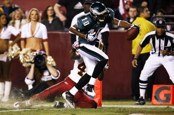 LANDOVER, MD - OCTOBER 26:  DeSean Jackson #10 of the Philadelphia Eagles trips over Chris Horton #48 of the Washington Redskins to score a touchdown in the second quarter of the game at FedEx Field October 26, 2009 in Landover, Maryland. (Photo by Win McNamee/Getty Images)