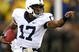 ANN ARBOR, MI - OCTOBER 24:  Daryll Clark #17 of the Penn State Nittany Lions points out blocks during a fourth quarter run while playing the Michigan Wolverines on October 24, 2009 at Michigan Stadium in Ann Arbor, Michigan. Penn State won the game 35-10. (Photo by Gregory Shamus/Getty Images)