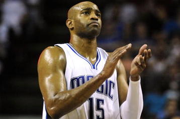 ORLANDO, FL - OCTOBER 28:  Vince Carter #15 of the Orlando Magic celebrates a play during the first half against the Philadelphia 76ers on October 28, 2009 at Amway Arena in Orlando, Florida.  NOTE TO USER: User expressly acknowledges and agrees that, by downloading and/or using this Photograph, user is consenting to the terms and conditions of the Getty Images License Agreement.  (Photo by Sam Greenwood/Getty Images)