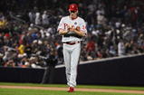 NEW YORK - OCTOBER 28:  Cliff Lee #34 of the Philadelphia Phillies rubs the baseball in his hands against the New York Yankees in Game One of the 2009 MLB World Series at Yankee Stadium on October 28, 2009 in the Bronx borough of New York City.  (Photo by Jim McIsaac/Getty Images)