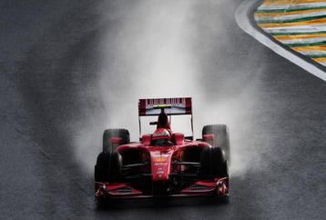 SAO PAULO, BRAZIL - OCTOBER 17:  Kimi Raikkonen of Finland and Ferrari drives during qualifying for the Brazilian Formula One Grand Prix at the Interlagos Circuit on October 17, 2009 in Sao Paulo, Brazil.  (Photo by Clive Mason/Getty Images)