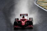SAO PAULO, BRAZIL - OCTOBER 17:  Kimi Raikkonen of Finland and Ferrari drives during qualifying for the Brazilian Formula One Grand Prix at the Interlagos Circuit on October 17, 2009 in Sao Paulo, Brazil.  (Photo by Clive Mason/Getty Images)