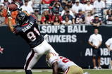 HOUSTON - OCTOBER 25:  Tight-end Owen Daniels #81 of the Houston Texans completes a pass in front of safety Mark Roman #26 of the San Francisco 49ers at Reliant Stadium on October 25, 2009 in Houston, Texas.  (Photo by Bob Levey/Getty Images)