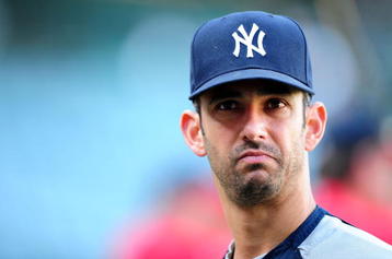 ANAHEIM, CA - OCTOBER 22:  Jorge Posada #20 of the New York Yankees watches batting practice prior to the start of Game Five of the ALCS against the Los Angeles Angels of Anaheim during the 2009 MLB Playoffs at Angel Stadium on October 22, 2009 in Anaheim, California.  (Photo by Jacob de Golish/Getty Images)