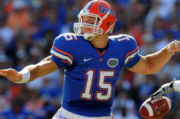 GAINESVILLE, FL - OCTOBER 17: Quarterback Tim Tebow #15 of the Florida Gators fumbles before passing in the first quarter against the University of Arkansas Razorbacks October 17, 2009 at Ben Hill Griffin Stadium in Gainesville, Florida.  (Photo by Al Messerschmidt/Getty Images)
