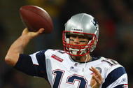 LONDON, ENGLAND - OCTOBER 25:  Tom Brady (#12) of the New England Patriots throws the ball during the NFL International Series match between New England Patriots and Tampa Bay Buccaneers at Wembley Stadium on October 25, 2009 in London, England. This is the third occasion where a regular season NFL match has been played in London.  (Photo by Julian Finney/Getty Images)