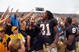SOUTH BEND, IN - SEPTEMBER 13: Sergio Brown #31 of the Notre Dame Fighting Irish celebrates with fans after a 35-17 victory over the Michigan Wolverines on September 13, 2008 at Notre Dame Stadium in South Bend, Indiana. (Photo by Gregory Shamus/Getty Images)