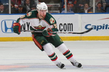 UNIONDALE, NY - MARCH 25: Pierre-Marc Bouchard #96 of the Minnesota Wild skates against the New York Islanders on March 25, 2009 at the Nassau Coliseum in Uniondale, New York. (Photo by Bruce Bennett/Getty Images)