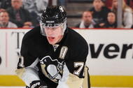 PITTSBURGH - OCTOBER 20:  Center Evgeni Malkin #71 of the Pittsburgh Penguins skates with the puck against the St. Louis Blues on October 20, 2009 at Mellon Arena in Pittsburgh, Pennsylvania.  (Photo by Jamie Sabau/Getty Images)