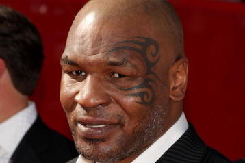LOS ANGELES, CA - JULY 15:  Former heavyweight champion Mike Tyson arrives at the 2009 ESPY Awards held at Nokia Theatre LA Live on July 15, 2009 in Los Angeles, California. The 17th annual ESPYs will air on Sunday, July 19 at 9PM ET on ESPN.  (Photo by Jason Merritt/Getty Images)