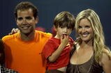 LOS ANGELES, CA - JULY 27:  Tournament honoree Pete Sampras poses for a portrait with son Ryan and wife Bridgette Wilson during the LA Tennis Open Day 1 at Los Angeles Tennis Center - UCLA on July 27, 2009 in Los Angeles, California.  (Photo by Stephen Dunn/Getty Images)