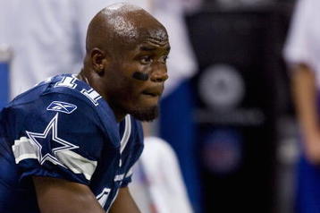 ST. LOUIS, MO - OCTOBER 19: Roy Williams #11 of the Dallas Cowboys watches his team loose to the St. Louis Rams at the Edward Jones Dome on October 19, 2008 in St. Louis, Missouri.  The Rams beat the Cowboys 34-14.  (Photo by Dilip Vishwanat/Getty Images)