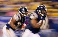 SAN DIEGO - DECEMBER 17: Runningbacks Michael Turner #33 and Lorenzo Neal #41 of the San Diego Chargers return a kick against the Kansas City Chiefs during their NFL game on December 17, 2006 at Qualcomm Stadium in San Diego, California. (Photo by Donald Miralle/Getty Images)