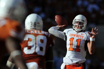 AUSTIN, TX - OCTOBER 25:  Quarterback Zac Robinson #11 of the Oklahoma State Cowboys during play against the Texas Longhorns at Texas Memorial Stadium on October 25, 2008 in Austin, Texas.  (Photo by Ronald Martinez/Getty Images)