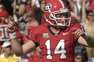 ATHENS, GA - SEPTEMBER 29: Quarterback Joe Cox #14 of the Georgia Bulldogs celebrates a late-game touchdown against the Mississippi Rebels at Sanford Stadium on September 29, 2007 in Athens, Georgia. (Photo by Al Messerschmidt/Getty Images)