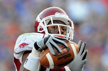 GAINESVILLE, FL - OCTOBER 17: Wide receiver Greg Childs #85 of the Arkansas Razorbacks grabs a pass for a touchdown against the Florida Gators October 17, 2009 at Ben Hill Griffin Stadium in Gainesville, Florida.  (Photo by Al Messerschmidt/Getty Images)