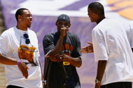 LOS ANGELES, CA - JUNE 17:  (L-R) Shannon Brown, Kobe Bryant and Trevor Ariza of the Los Angeles Lakers celebrate on stage during the 2009 NBA Championship Victory Parade and rally at the Los Angeles Memorial Coliseum on June 17, 2009 in Los Angeles, California.  (Photo by Jeff Gross/Getty Images)