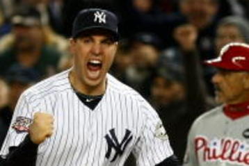 NEW YORK - OCTOBER 29:  Mark Teixeira #25 of the New York Yankees reacts after a double play to end the eighth inning against the Philadelphia Phillies in Game Two of the 2009 MLB World Series at Yankee Stadium on October 29, 2009 in the Bronx borough of New York City.  (Photo by Chris McGrath/Getty Images)