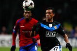 MOSCOW, RUSSIA - OCTOBER 21: Nani of Manchester United FC in action against Chidi Odiah of PFC CSKA Moscow during the UEFA Champions League group B match between CSKA Moscow and Manchester United at the Pat Luzhniki Stadium on October 21, 2009 in Moscow, Russia.  (Photo by Dmitry Korotayev/Epsilon/Getty Images)