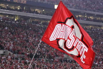 COLUMBUS, OH - NOVEMBER 18:  Ohio State Buckeyes mascot Brutus Buckeye waves a giant flag during the game against the Michigan Wolverines on November 18, 2006 at Ohio Stadium in Columbus, Ohio.  Ohio State won 42-39.  (Photo by Gregory Shamus/Getty Images)