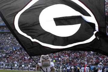 ORLANDO, FL - JANUARY 1: The mascot of the University of Georgia waoves a giant flag and celebrates a touchdown against the Michigan State Spartans at the 2009 Capital One Bowl at the Citrus Bowl on January 1, 2009 in Orlando, Florida.  (Photo by Al Messerschmidt/Getty Images)