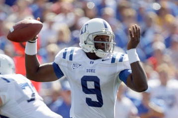 LAWRENCE, KS - SEPTEMBER 19:  Quarterback Thaddeus Lewis #9 of the Duke Blue Devils looks to pass the ball during the game against the Kansas Jayhawks at Kivisto Field at Memorial Stadium on September 19, 2009 in Lawrence, Kansas. (Photo by Jamie Squire/Getty Images)