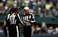 SEATTLE , WA - OCTOBER 18:  Referees talks during the Seattle Seahawks game against the Arizona Cardinals at Qwest Field on October 18, 2009 in Seattle, Washington.  (Photo by Jonathan Ferrey/Getty Images)
