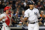 NEW YORK - OCTOBER 29:  Alex Rodriguez #13 of the New York Yankees reacts after striking out against Pedro Martinez #45 of the Philadelphia Phillies in Game Two of the 2009 MLB World Series at Yankee Stadium on October 29, 2009 in the Bronx borough of New York City.  (Photo by Jed Jacobsohn/Getty Images)