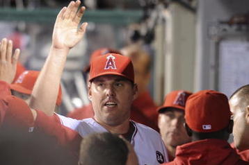 ANAHEIM, CA - OCTOBER 08:  Starting pitcher John Lackey #41of the Los Angeles Angels of Anaheim  celebrates with teammates in the dugout after coming out of the game in the eight inning against Boston Red Sox in Game One of the ALDS during the 2009 MLB Playoffs at Angel Stadium on October 8, 2009 in Anaheim, California.  (Photo by Lisa Blumenfeld/Getty Images)