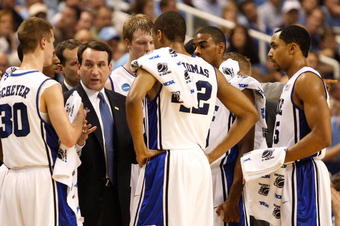 GREENSBORO, NC - MARCH 21:  Head coach Mike Krzyzewski of the Duke Blue Devils directs his team against the Texas Longhorns during the second round of the NCAA Division I Men's Basketball Tournament at the Greensboro Coliseum on March 21, 2009 in Greensboro, North Carolina.  (Photo by Streeter Lecka/Getty Images)