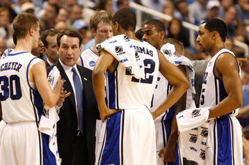 GREENSBORO, NC - MARCH 21:  Head coach Mike Krzyzewski of the Duke Blue Devils directs his team against the Texas Longhorns during the second round of the NCAA Division I Men's Basketball Tournament at the Greensboro Coliseum on March 21, 2009 in Greensboro, North Carolina.  (Photo by Streeter Lecka/Getty Images)