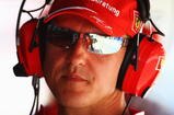 VALENCIA, SPAIN - AUGUST 21:  Former Ferrari F1 World Champion Michael Schumacher of Germany watches from the pitwall during practice for the European Formula One Grand Prix at the Valencia Street Circuit on August 21, 2009, in Valencia, Spain.  (Photo by Ryan Pierse/Getty Images)