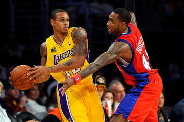 LOS ANGELES, CA - OCTOBER 27:  Shannon Brown #12 of the Los Angeles Lakers looks to pass against Rasual Butler #45 of the Los Angeles Clippers during the season opening game at Staples Center on October 27, 2009 in Los Angeles, California.  The Lakers won 99-92.  NOTE TO USER: User expressly acknowledges and agrees that, by downloading and or using this photograph, User is consenting to the terms and conditions of the Getty Images License Agreement. Mandatory Copyright Notice: Copyright 2009 NBAE  (Photo by Kevork Djansezian/Getty Images)