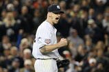 NEW YORK - OCTOBER 29:  A.J. Burnett #36 of the New York Yankees reacts in the seventh inning agaist the Philadelphia Phillies in Game Two of the 2009 MLB World Series at Yankee Stadium on October 29, 2009 in the Bronx borough of New York City.  (Photo by Jed Jacobsohn/Getty Images)