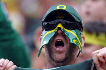EUGENE, OR - SEPTEMBER 19: An Oregon fan shows his colors in the third quarter of the game between the Utah Utes and the Oregon Ducks at Autzen Stadium on September 19, 2009 in Eugene, Oregon. Oregon won the game 31-24. (Photo by Steve Dykes/Getty Images)