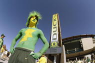 EUGENE, OR - SEPTEMBER 27:  A University of Oregon fan poses outside the Autzen stadium before the game against the Washington State University Cougars on September 27, 2003 in Eugene, Oregon. Washington State defeated Oregon 55-16.  (Photo by Jonathan Ferrey/Getty Images)