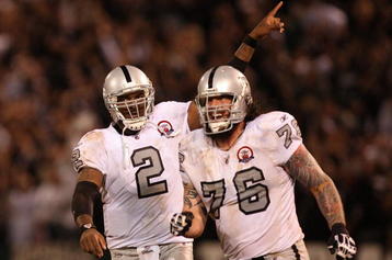 OAKLAND, CA - SEPTEMBER 14:  (L-R) JaMarcus Russell #2 and Robert Gallery #76 of the Oakland Raiders celebrate after Russell threw a 57-yard touchdown pass to Louis Murphy #18 in the fourth quarter against the San Diego Chargers on September 14, 2009 at the Oakland-Alameda County Coliseum in Oakland, California.  (Photo by Ezra Shaw/Getty Images)