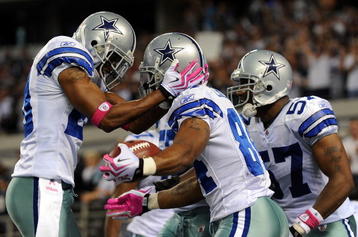 ARLINGTON, TX - OCTOBER 25:  (L-R) Alan Ball #20 and Patrick Crayton #84 of the Dallas Cowboys celebrate a touchdown against the Atlanta Falcons at Cowboys Stadium on October 25, 2009 in Arlington, Texas.  (Photo by Ronald Martinez/Getty Images)