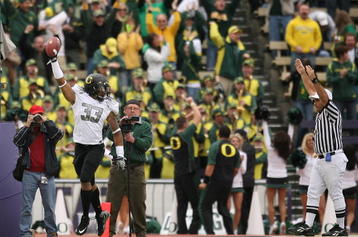 SEATTLE - OCTOBER 24:  Defensive end Tyrell Irvin #33 of the Oregon Ducks celebrates after recovering a fumble for a touchdown  against the Washington Huskies on October 24, 2009 at Husky Stadium in Seattle, Washington. The Ducks defeated the Huskies 43-19. (Photo by Otto Greule Jr/Getty Images)