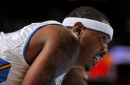 DENVER - OCTOBER 28: Carmelo Anthony #15 of the Denver Nuggets looks on while awaiting a free throw against the Utah Jazz during NBA action at Pepsi Center on October 28, 2009 in Denver, Colorado. The Nuggets defeated the Jazz 114-105. (Photo by Doug Pensinger/Getty Images)