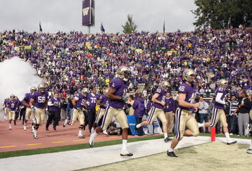 SEATTLE - OCTOBER 24: D'Andre Goodwin #11 of the Washington Huskies runs onto the field before the game against the Oregon Ducks on October 24, 2009 at Husky Stadium in Seattle, Washington. The Ducks defeated the Huskies 43-19. (Photo by Otto Greule Jr/Getty Images)