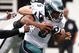 OAKLAND, CA - OCTOBER 18: Donovan McNabb #5 of the Philadelphia Eagles is sacked by Trevor Soctt #91 of the Oakland Raiders during an NFL game at the Oakland-Alameda County Coliseum on October 18, 2009 in Oakland, California. (Photo by Jed Jacobsohn/Getty Images)