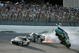 TALLADEGA, AL - APRIL 26:  Carl Edwards, driver of the #99 Claritin Ford, goes airborne as Ryan Newman, driver of the #39 Steweart-Haas Racing Chevrolet suffers damage and Brad Keselowski, driver of the #09 Miccosukee Indian Gaming Chevrolet drives at the conclusion of the NASCAR Sprint Cup Series Aaron's 499 at Talladega Superspeedway on April 26, 2009 in Talladega, Alabama.  (Photo by Jerry Markland/Getty Images for NASCAR)