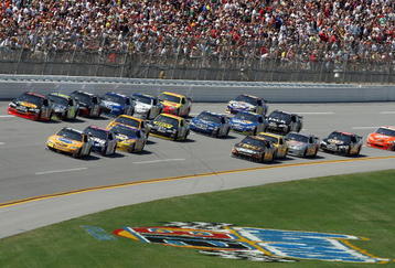TALLADEGA, AL - APRIL 26:  Kyle Busch, driver of the #18 Pedigree Toyota, leads a group of cars during the NASCAR Sprint Cup Series Aaron's 499 at Talladega Superspeedway on April 26, 2009 in Talladega, Alabama.  (Photo by Christian Petersen/Getty Images)