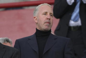 BIRMINGHAM, UNITED KINGDOM - OCTOBER 14:  Villa chairman Randy Lerner (r) takes his seat during the Barclays Premiership match between Aston villa and Tottenham Hotspur at Villa Park on October 14, 2006 in Birmingham, England.  (Photo by Stu Forster/Getty Images)